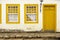 Old wood windows and door, painted yellow