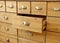 Old wooden antique chest of drawers with metal handles