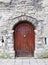 Old wooden arched door