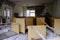 Old wooden baby beds in an abandoned kindergarten in Pripyat. Mess in the room
