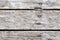 Old wooden background with horizontal weathered boards and rusty nails