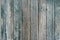 Old wooden barn board with a distressed surface.