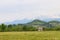 Old wooden barn in village in Caucasus mountains