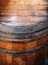 Old wooden Barrel close up. Natural grunge textured barrel. Dark