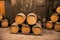 Old wooden barrels in the wine cellar of monastery