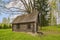 Old wooden bathhouse in rural area