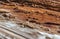 Old wooden beam affected by woodworm. Wood-eating larvae species beetle