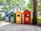 Old wooden bins blue green yellow red marked with