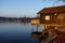 an old wooden boat house in Herrsching on Lake Ammersee in Bavaria on a clear and sunny December evening (Germany)