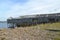 Old wooden boat shed in the settlement of Teriberka on the bank of the Barents Sea