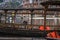 Old wooden boats moored on Tuo river shore in Fenghuang