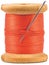 Old wooden bobbin with red thread isolated