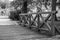 Old wooden bridge in the park in black and white