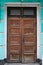 Old wooden brown door. Historical traditional architecture