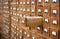 Old wooden card catalogue with one opened drawer