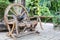 Old wooden chair made of wood wheel