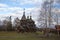 Old wooden Church built without a single nail, is located on the background of Suzdal on a rainy morning. Late in the fall. Rain.