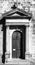 Old wooden church door. Entrance to the St Peter and Paul Church in Tanvald, Czech Republic