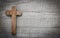 Old and wooden cross on a background