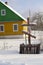 Old wooden cross standing at the crossroads in a village, Belarus.Old Christian orthodox tradition