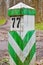 Old, wooden, demarcation, border sign, set in the woods
