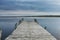 Old wooden dock jutting into Lake of the Woods, Minnesota on a cloudy day