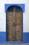 Old wooden door with carved decoration