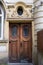 Old wooden door with character in the city of Krakow, Poand. Photo is taken in Kazimierz, the historic Jewish quarter