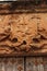 Old wooden door and coat of arms of the Holy Inquisition