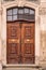 Old wooden door of an old historical building