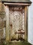 Old Wooden Door with Rusty Hinges and Handle