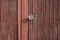 Old wooden door and rusty iron door knob