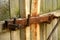 Old wooden door with rusty lock