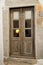 Old wooden door in stone wall