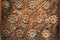 Old wooden doors with metal decorations closeup image