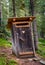 Old Wooden Earth Toilet Stands Remote In Forest