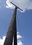 Old wooden electricity pole, wires, blue sky