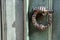 Old wooden entrance door with antique door handle