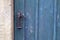 Old wooden entrance door with antique door handle