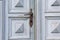 Old wooden entrance door with antique door handle