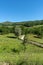 Old wooden fence along the dirt rural road