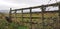 Old Wooden Fence Gate Looking Over Irish Farmland