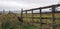 Old Wooden Fence Gate Looking Over Irish Farmland