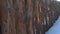 Old wooden fence and winter white snow