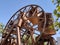 old wooden ferris wheel at medieval carnival in pamplona city