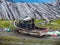 Old wooden fishing boat on land