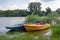 Old wooden fishing boats on a pond