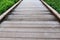 Old wooden floor footpath background.