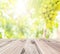 Old wooden floor in front of abstract blur grape farm background