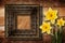 Old wooden frame with bunch of flower narcissus